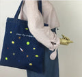 Shoulder bag with soft handle and inner patch pocket available in multiple colours including dark blue
