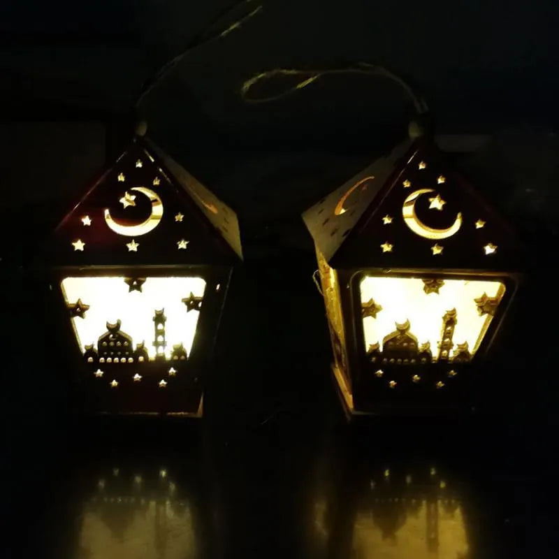 Three-dimensional carved boxwood house pendant with LED lights in blue colour option