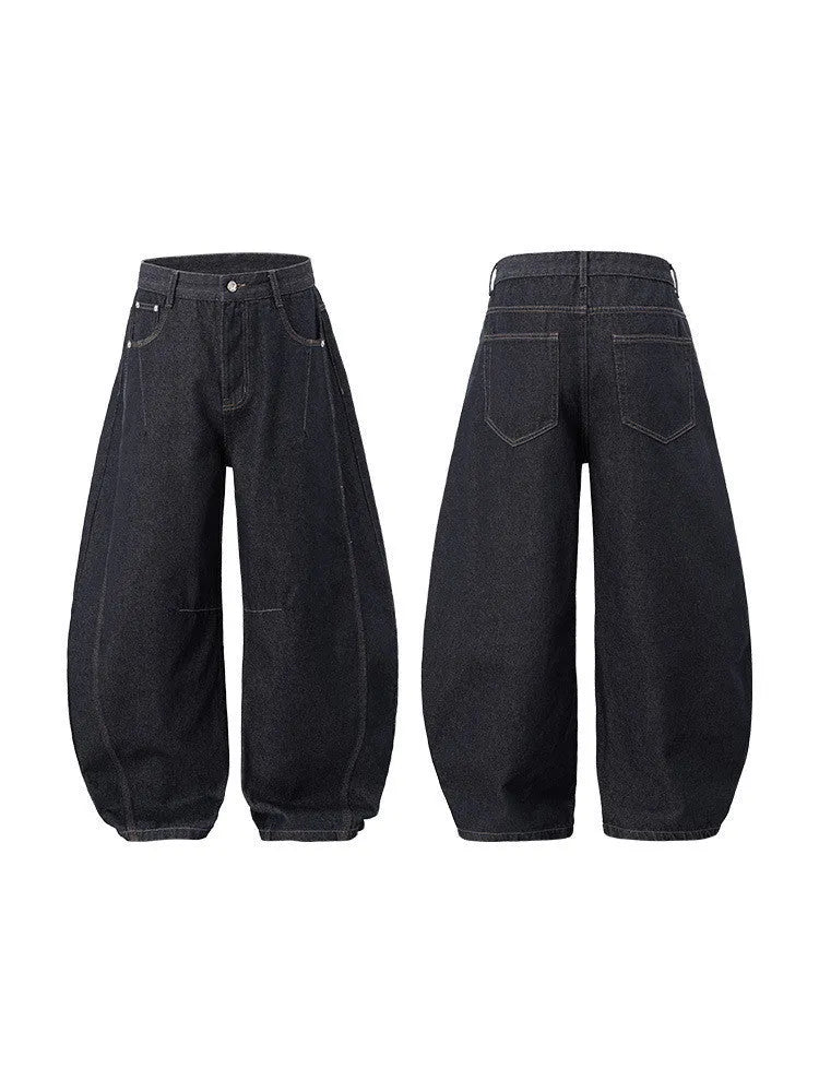 Men's wide leg denim trousers in original cow colour showing mid waist design and relaxed fit