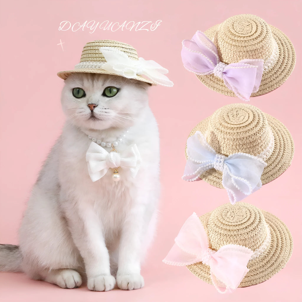 Pet cat wearing straw hat with pearl bow decoration in princess style costume accessory
