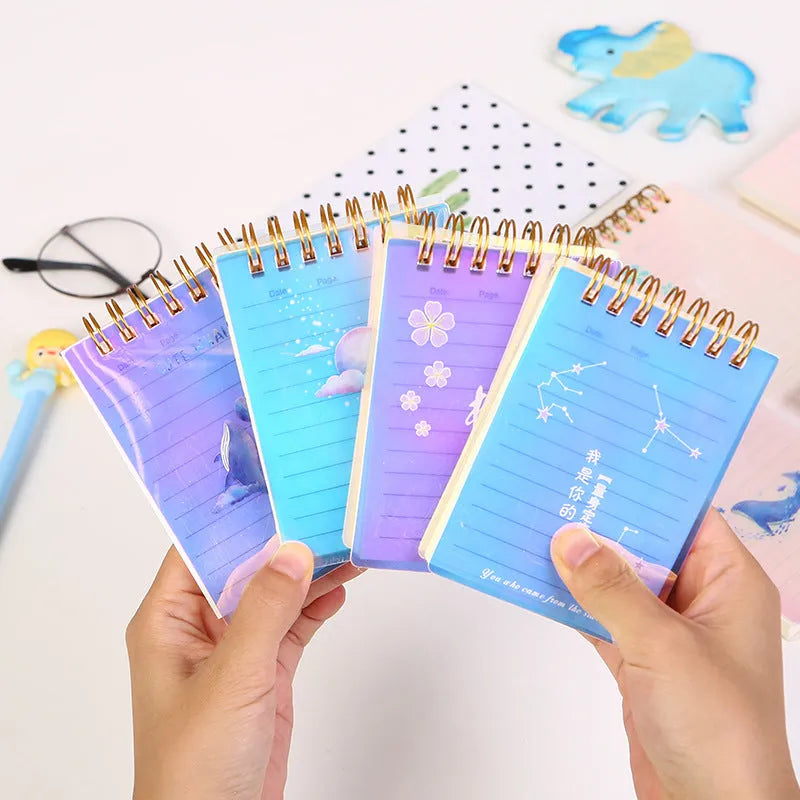 A7 spiral notebook with colourful PP cover, showing spiral binding and open pages
