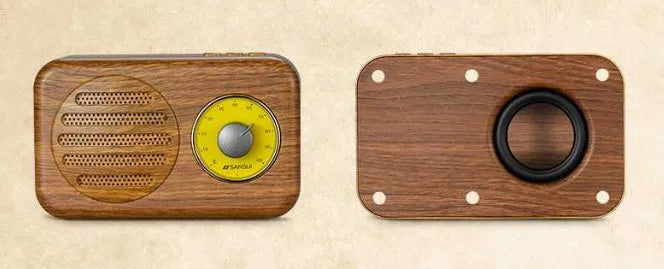 Portable Bluetooth speaker in wood grain finish with FM radio and micro USB cable