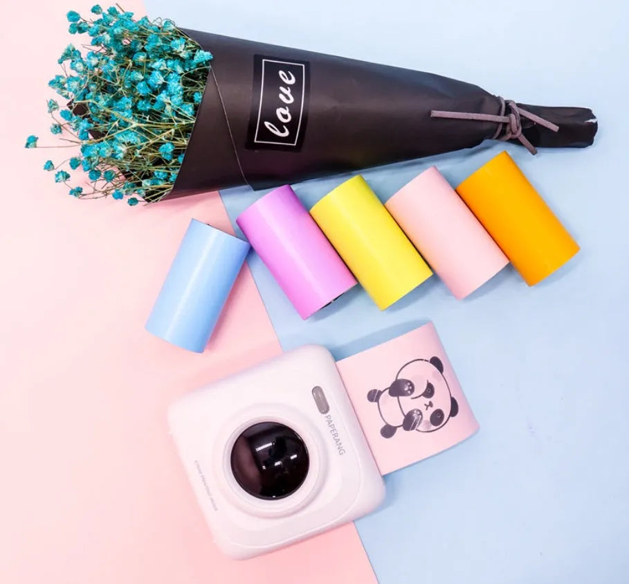 PerPage mini wireless portable thermal printer paper roll in multiple colours, showing label and sticker options