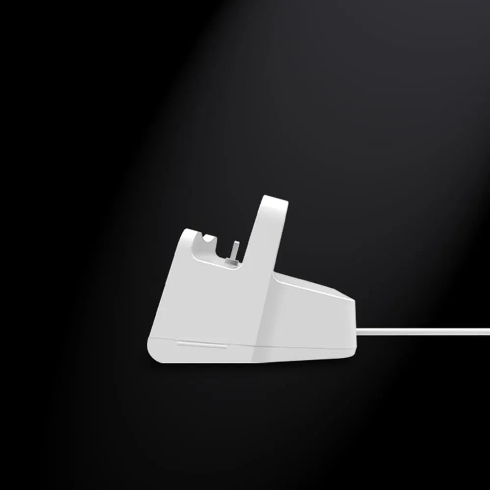 White headphone charging base with fashion design on desk