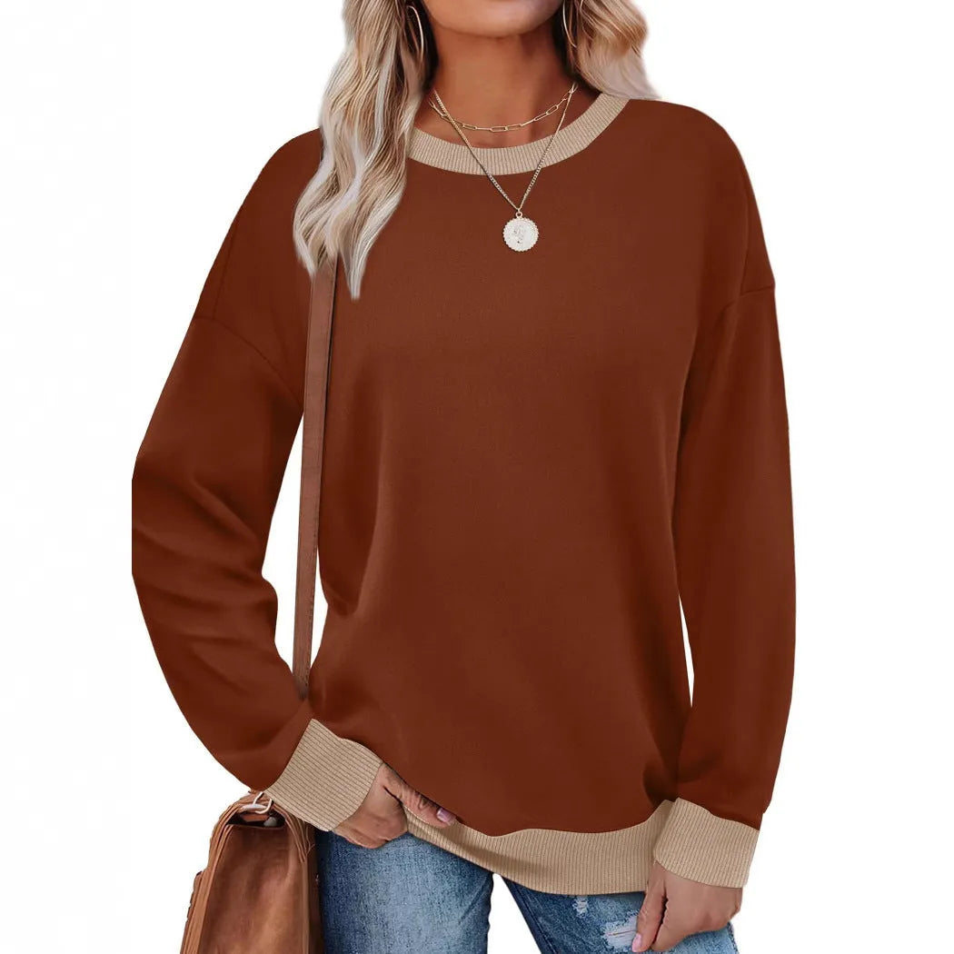 Women's loose striped long sleeve top in apricot colour on hanger