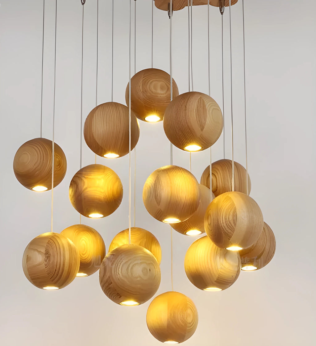 Nordic-style solid wood ball chandelier pendant light with adjustable cord, shown with a wooden disc base.