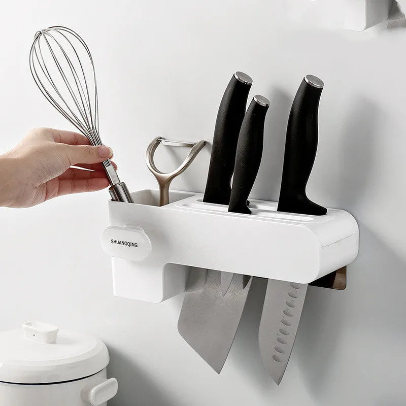 White plastic kitchen knife rack with modern simple design on countertop