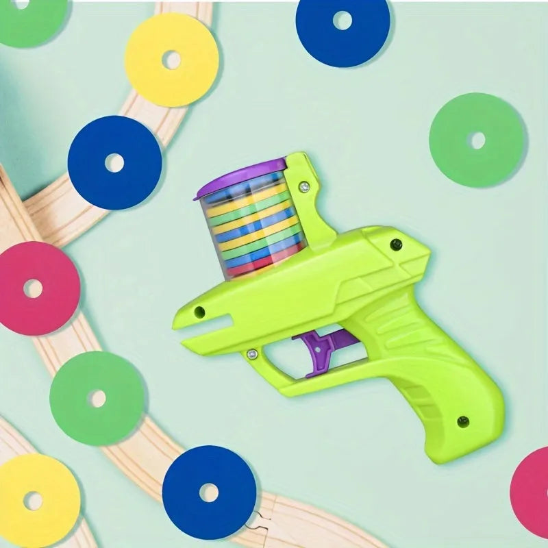 Green battery-free cat toy launcher with foam disc for indoor feline play