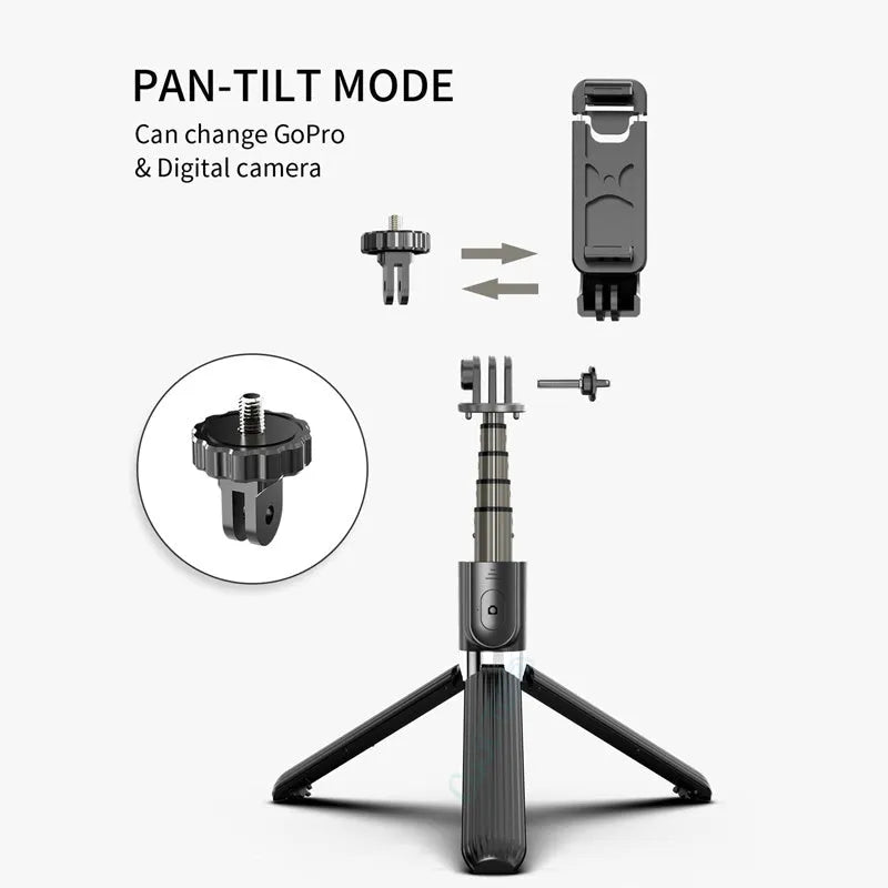 Black adjustable aluminium phone tripod selfie stick extended next to an Apple iPhone.