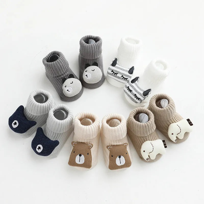 Non-slip baby socks with dispensing glue feature in cotton material, showing mid-calf height and colour options