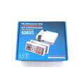 Compact black NES 8-bit retro game console with two classic controllers on a white background.