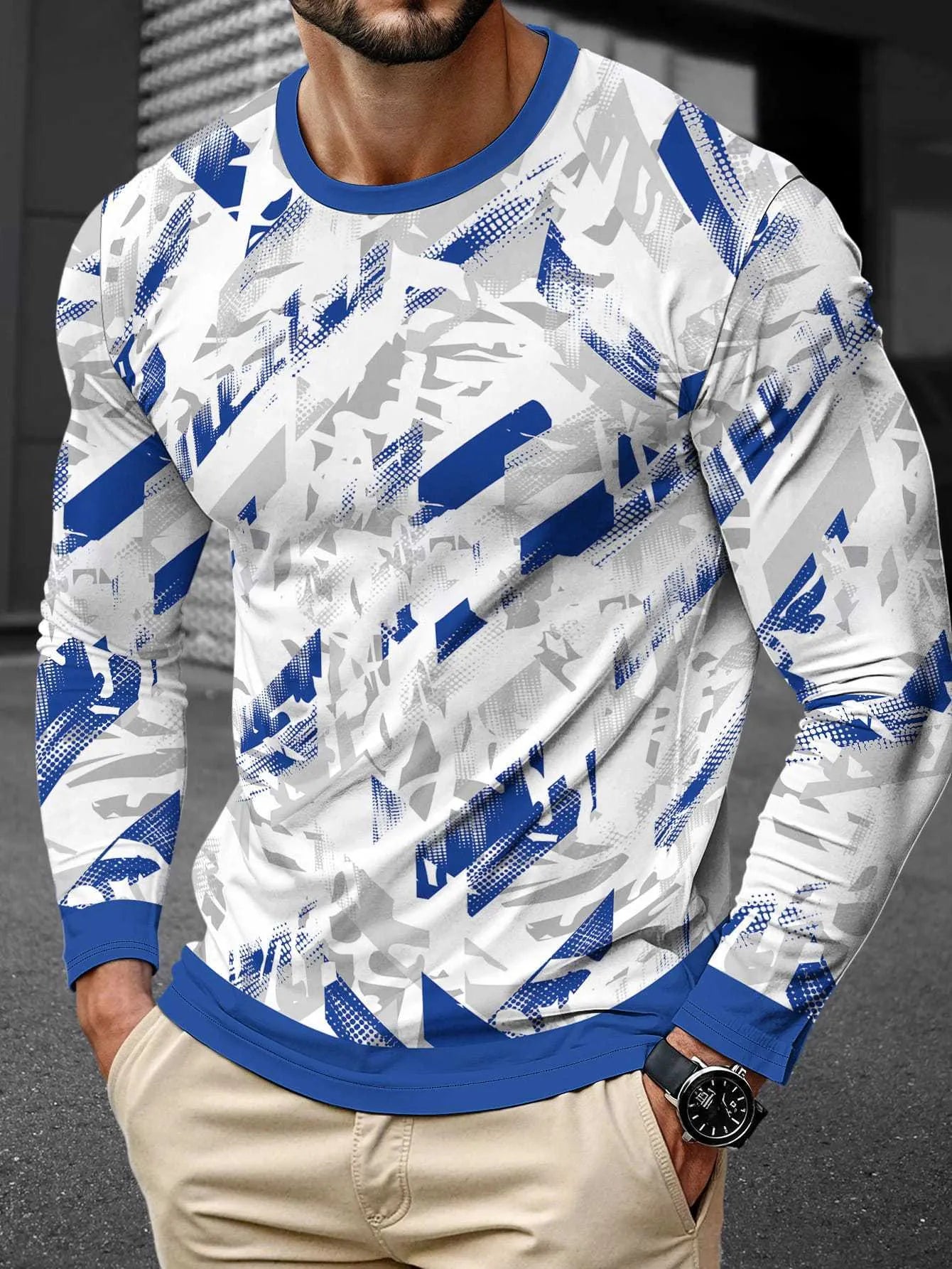 Man wearing a simple grey long sleeve round neck pullover made from milk silk fabric.