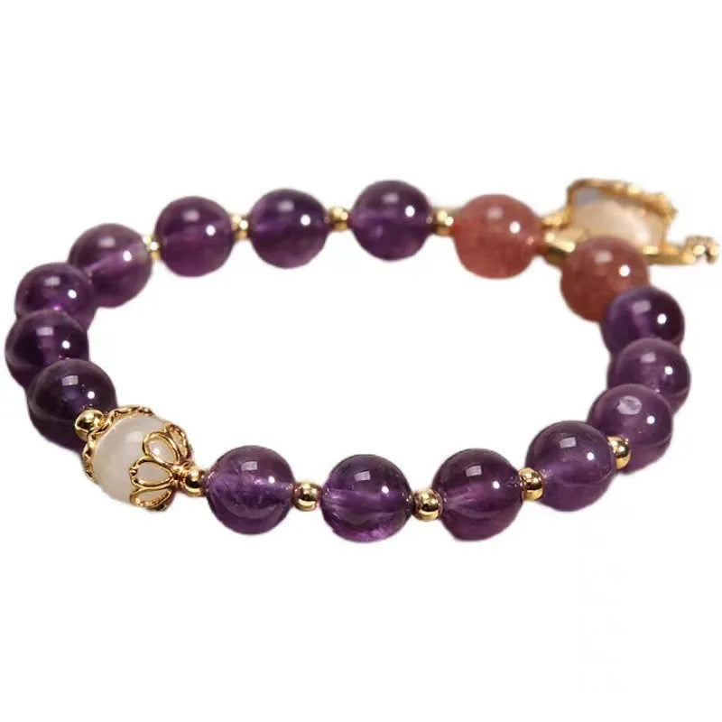 Women's copper bracelet with natural amethyst gemstones and drop-shaped longevity lock charm