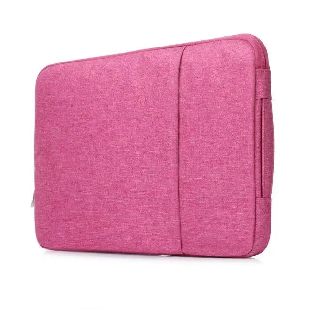 Grey canvas laptop sleeve case for a 12.9-inch iPad Pro, showing the YKK zipper and minimalist notebook design.