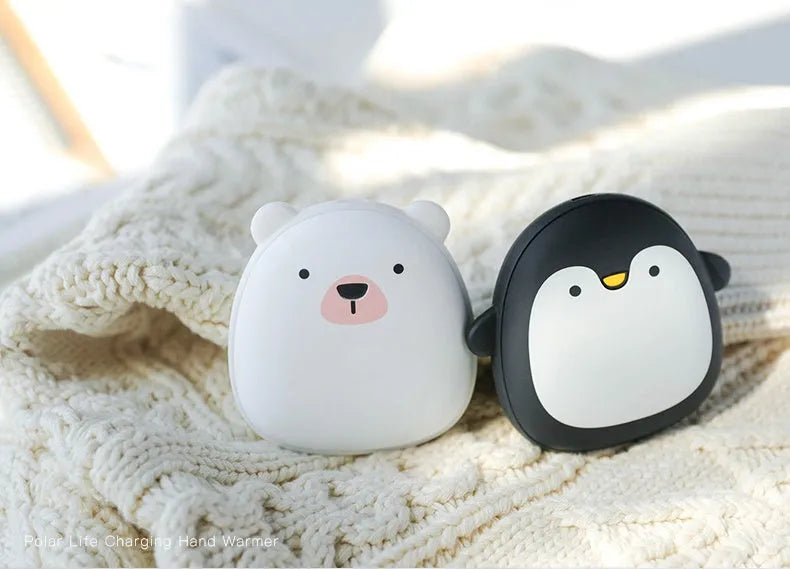 Cartoon penguin polar bear USB rechargeable hand warmer power bank showing black, white, and white-black colour options