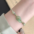 Jade green double ring women's bracelet with peace buckle weaving on copper base