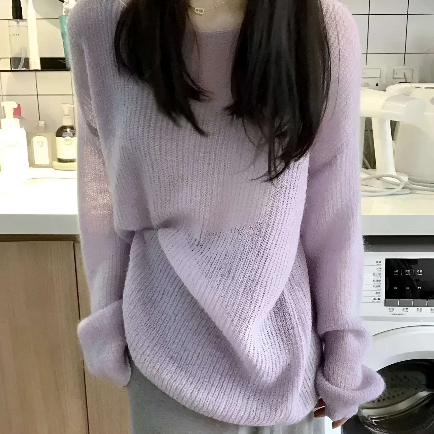 Purple women's sleeveless sweater with round neck and hollow-out pattern in ice silk fabric
