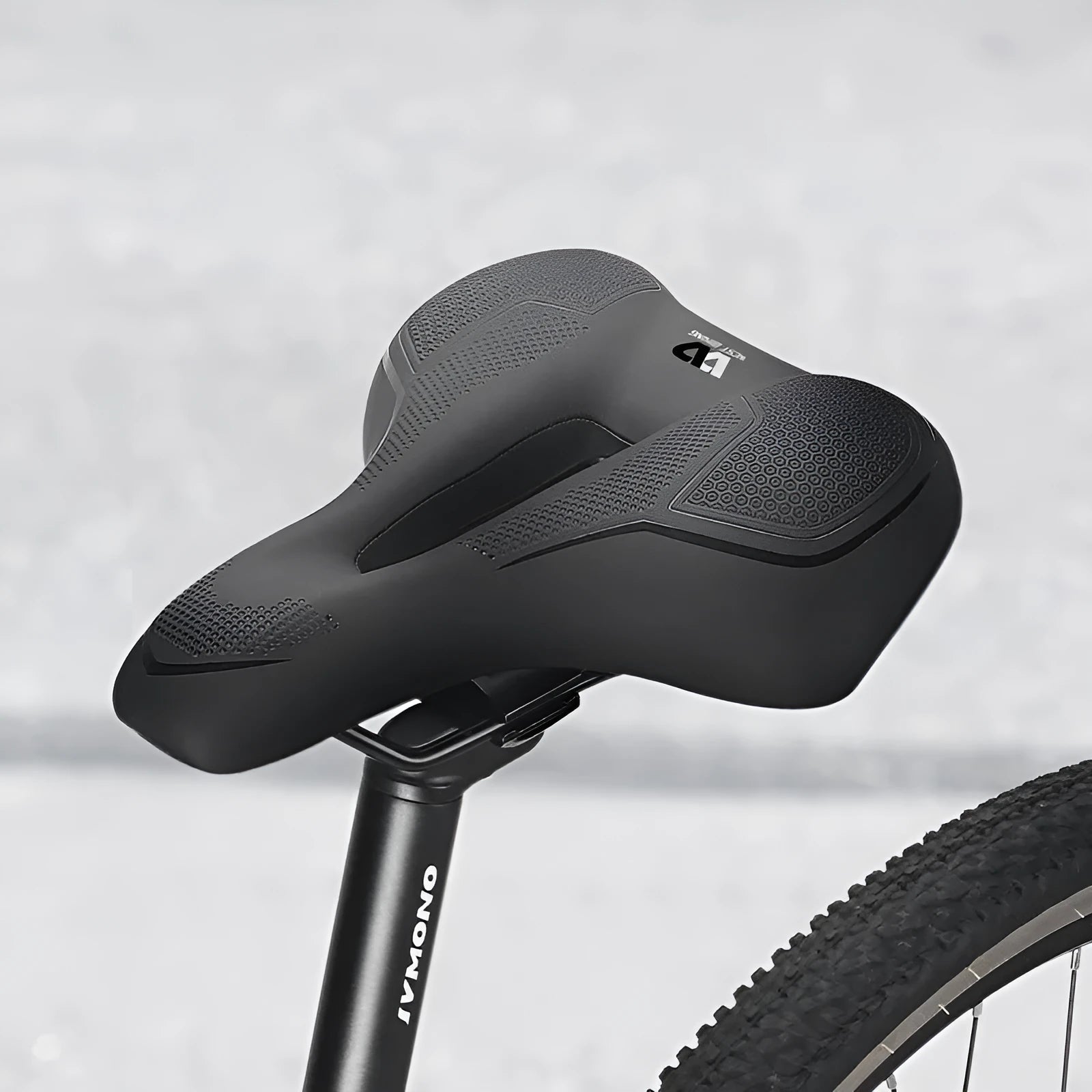 Bicycle saddle cushion with high elastic sponge padding in black or colourful casual and sporty designs.