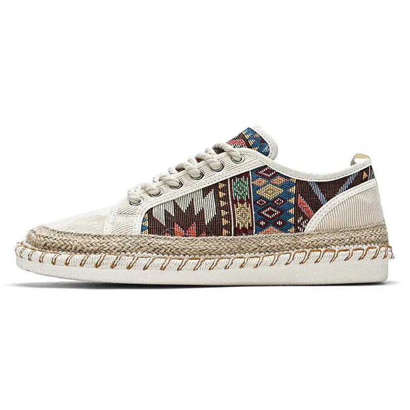 Men's beige and black cloth casual shoes with round toe and colour-block pattern, side view.