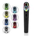 Black portable eye massager unit with light therapy and vibration functions on a neutral background.