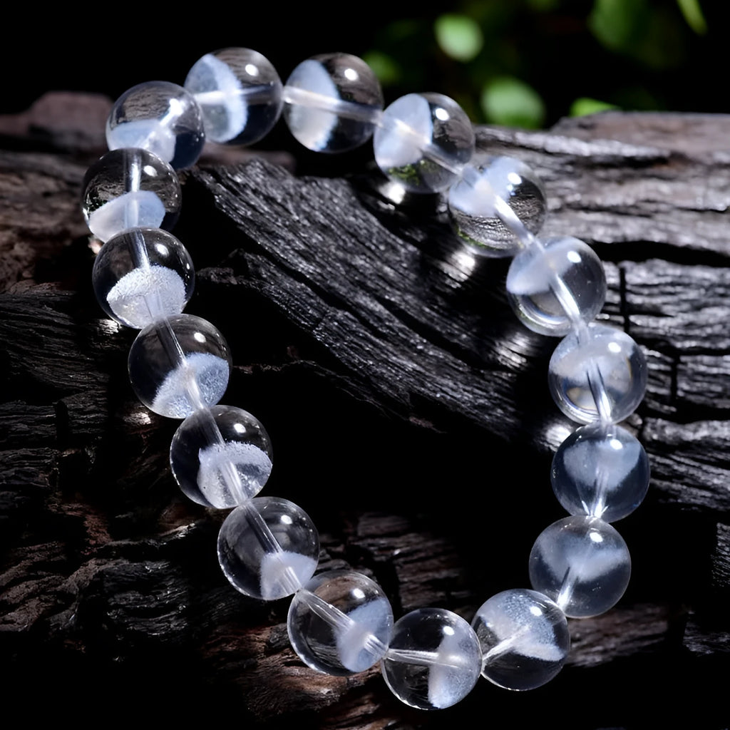 Women's white crystal pyramid bracelet with Ruyi charm showing natural ghost pyramid design