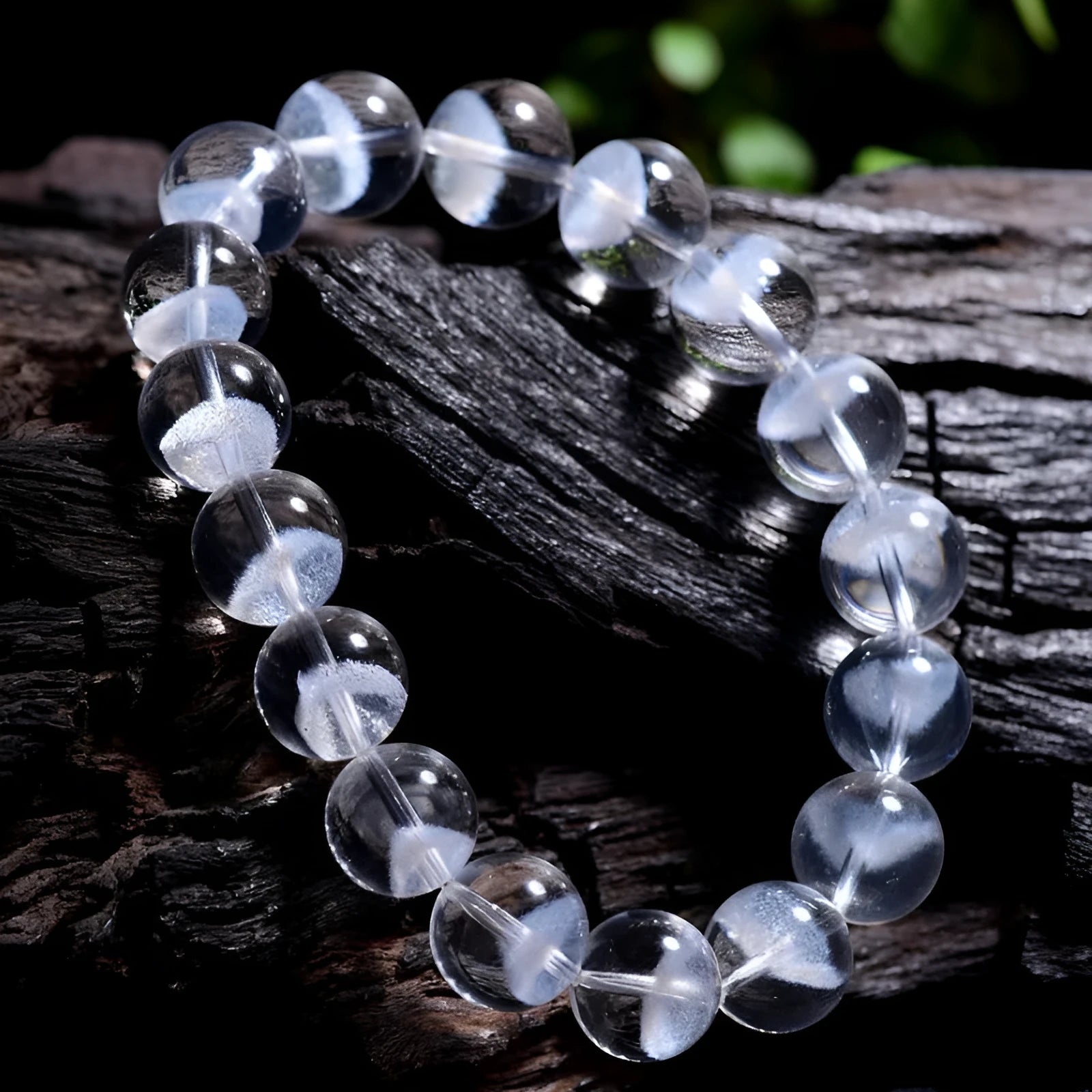 Women's white crystal pyramid bracelet with Ruyi charm showing natural ghost pyramid design