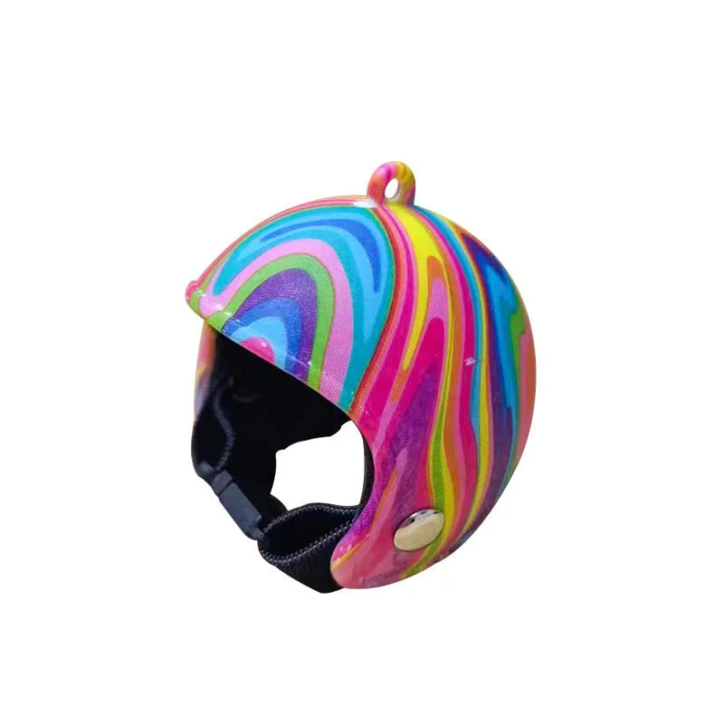 Colourful plastic chicken helmet for small pets on a white background