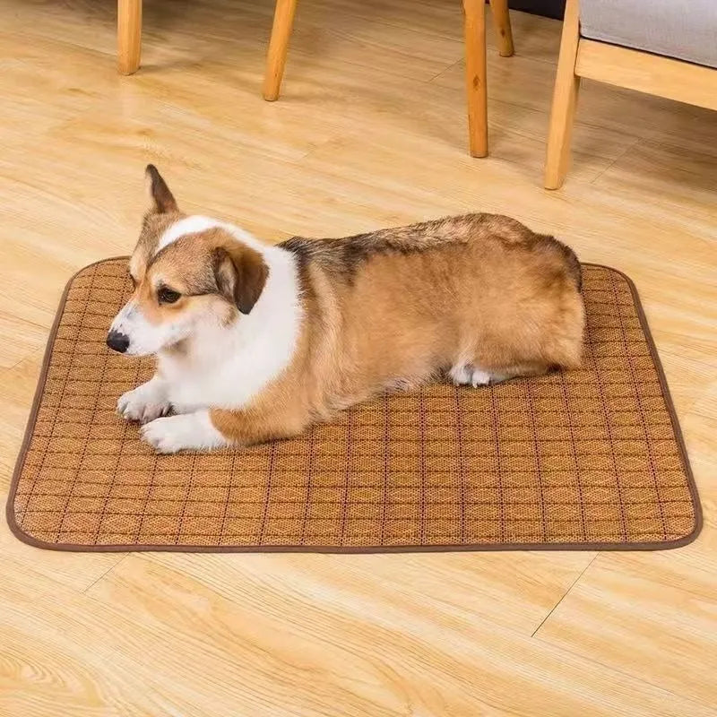 Brown rattan fibre cooling mat for dogs on a floor, showing its woven texture.