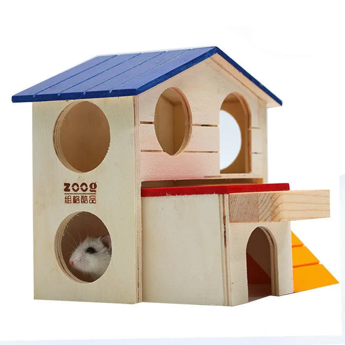 Blue-roofed wooden hamster chalet hideout and gnawing toy for small pets.