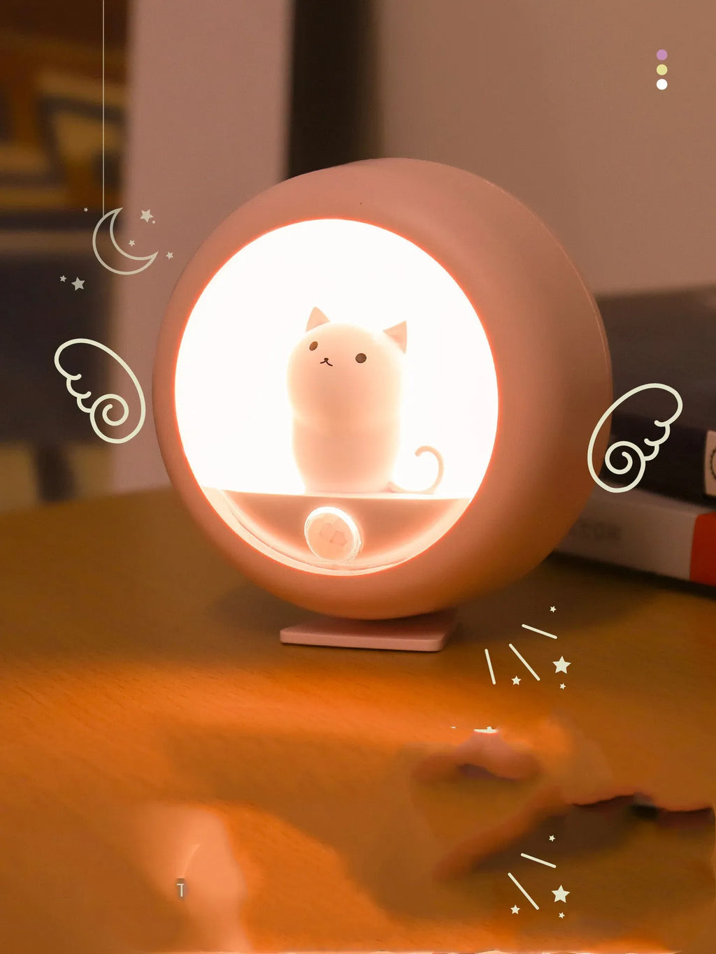 Baby bedside sleep lamp with projection feature showing orange, white and pink colour options