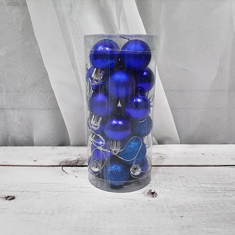Assorted shiny red, gold, silver, and blue 3 cm Christmas baubles in a box and a storage barrel.