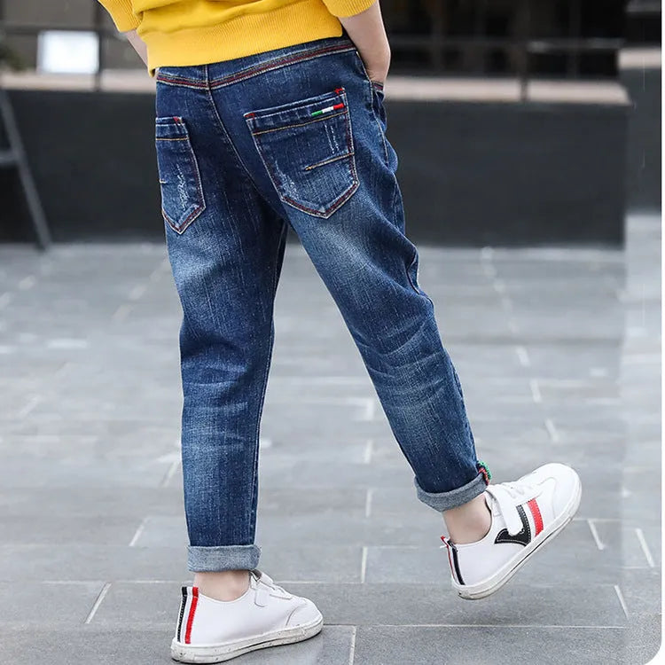 Boys' cotton denim mid-waist jeans in blue, size 140cm, front view