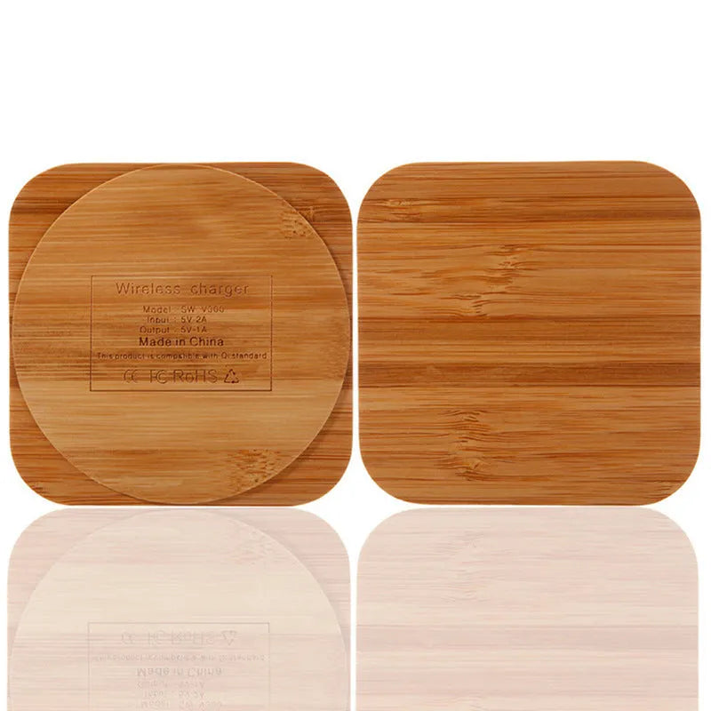 Square brown wooden bamboo 5W Qi wireless charging pad on a table