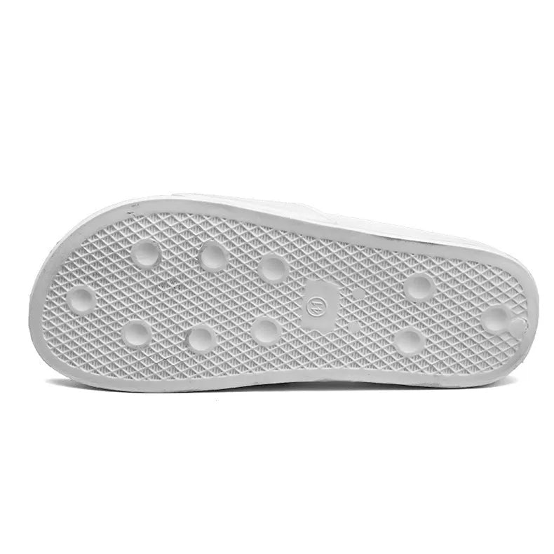 Black and white open-toe men's slippers with a rubber sole, shown on a size chart from 36 to 46.