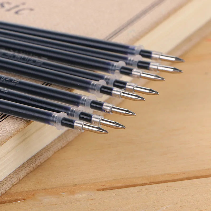 Automatic fade and disappear pen set with clear plastic holder and eight refill cartridges.