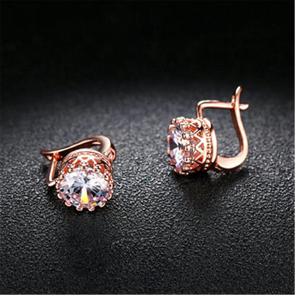 Korean retro style crown-shaped ear clips with rhinestones in rose gold and white gold colour options.