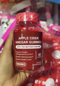 Bottle of apple cider vinegar gummy supplements containing 60 soft candy tablets for adult nutrition
