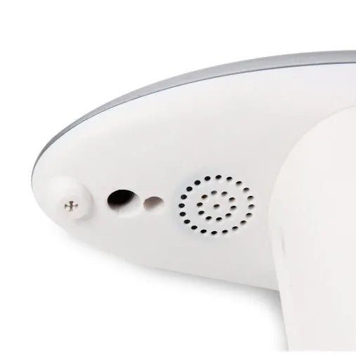 Automatic sensor soap dispenser on a desktop, white ABS plastic body with infrared sensor.