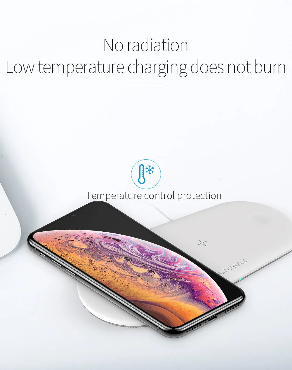 Black and white three-in-one wireless charging station for Apple iPhone, iWatch, and headphones on a desk.