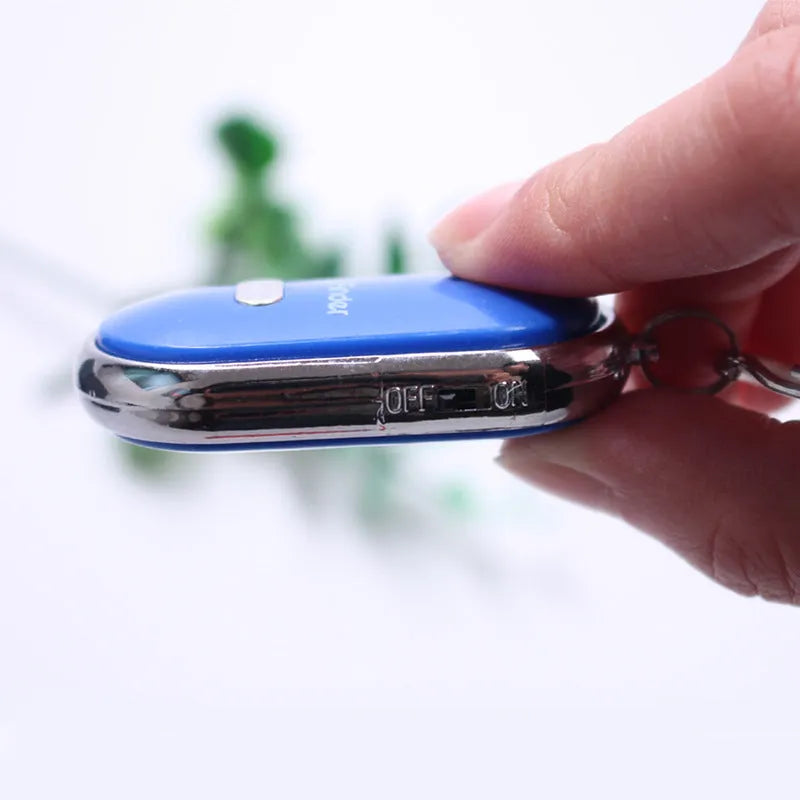 LED whistle control induction key ring key finder in plastic, 2.5cm x 8cm, blue colour
