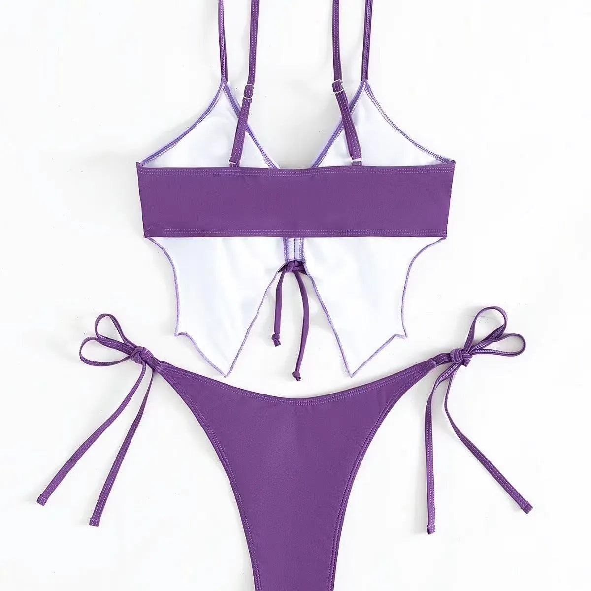 Women's purple bikini set with bow detail and high-leg side split design on briefs
