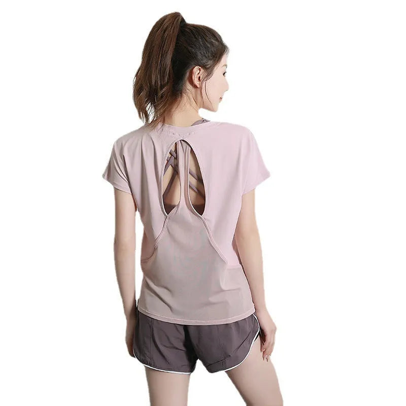 Women's short sleeve polyester sports T-shirt in pink colour for gym and running workouts