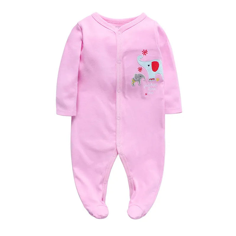 A soft cotton baby one-piece garment featuring a dinosaur print, shown on a hanger.