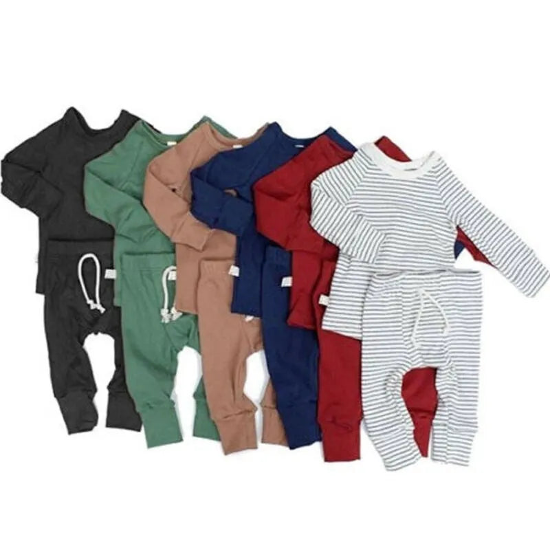 Blue cotton baby romper tracksuit set with cartoon pattern, shown on size chart for 6M to 24M.