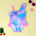 Girls' one-piece swimsuit with blue gradient fish scale print and flounced design.