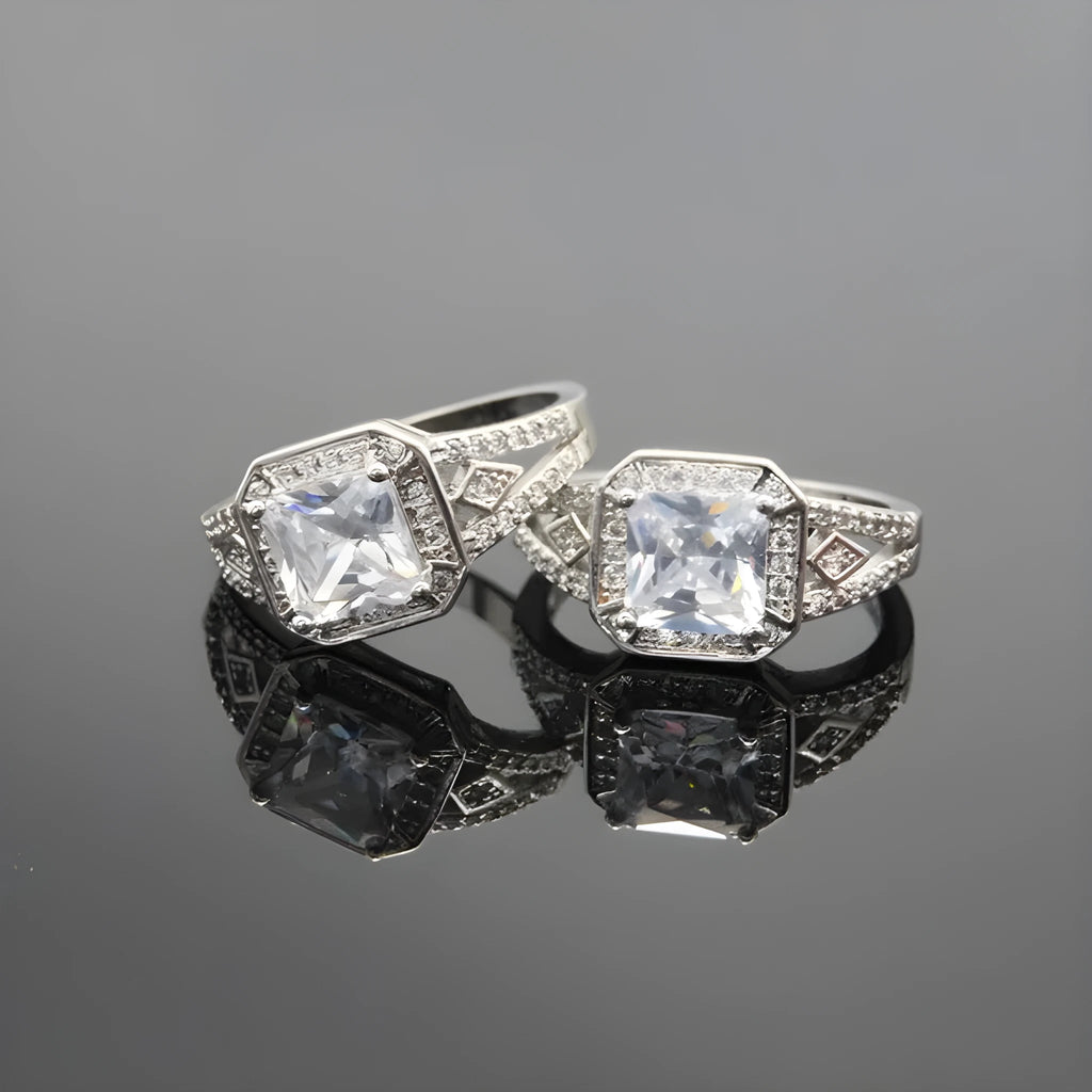 Hollow geometric zircon ring with quadrilateral detailing in platinum colour