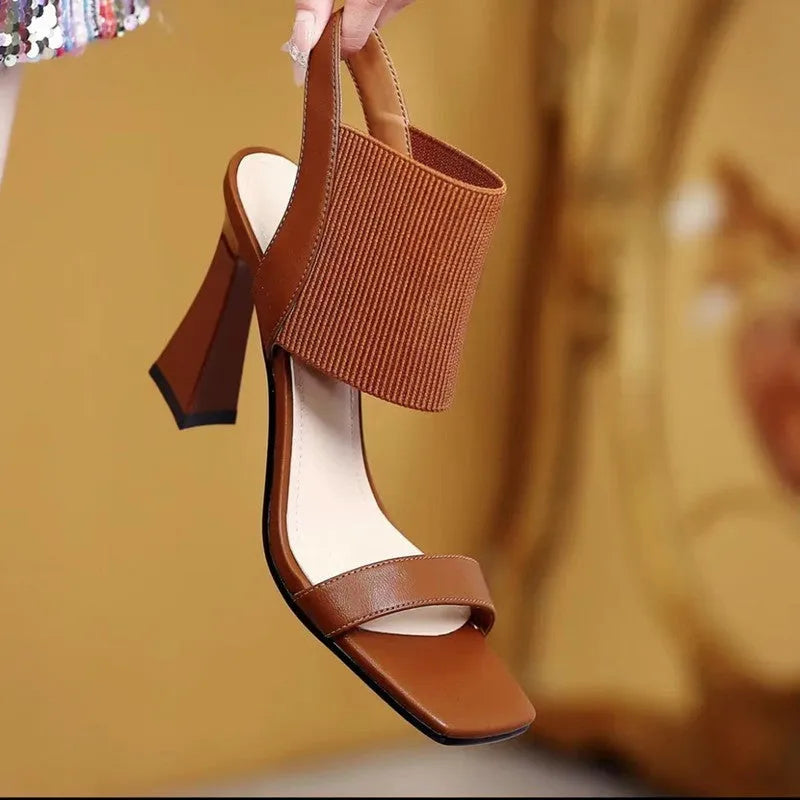 Women's high heel sandals with elastic straps in black, milky white, and brown colours