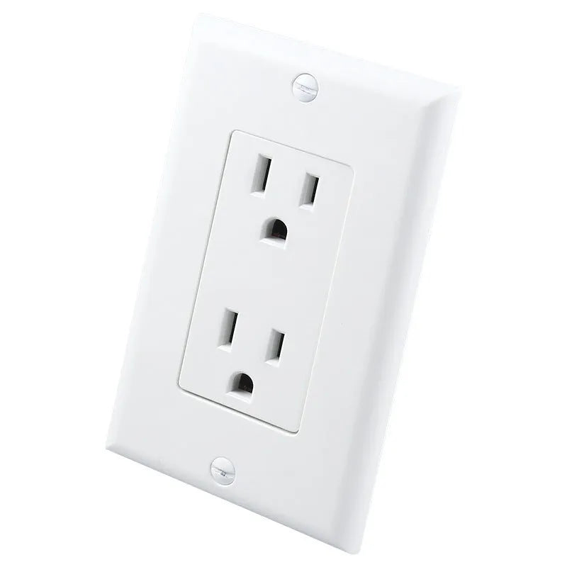 White socket induction night light with motion sensor plugged into a UK wall socket, illuminating a dark hallway.