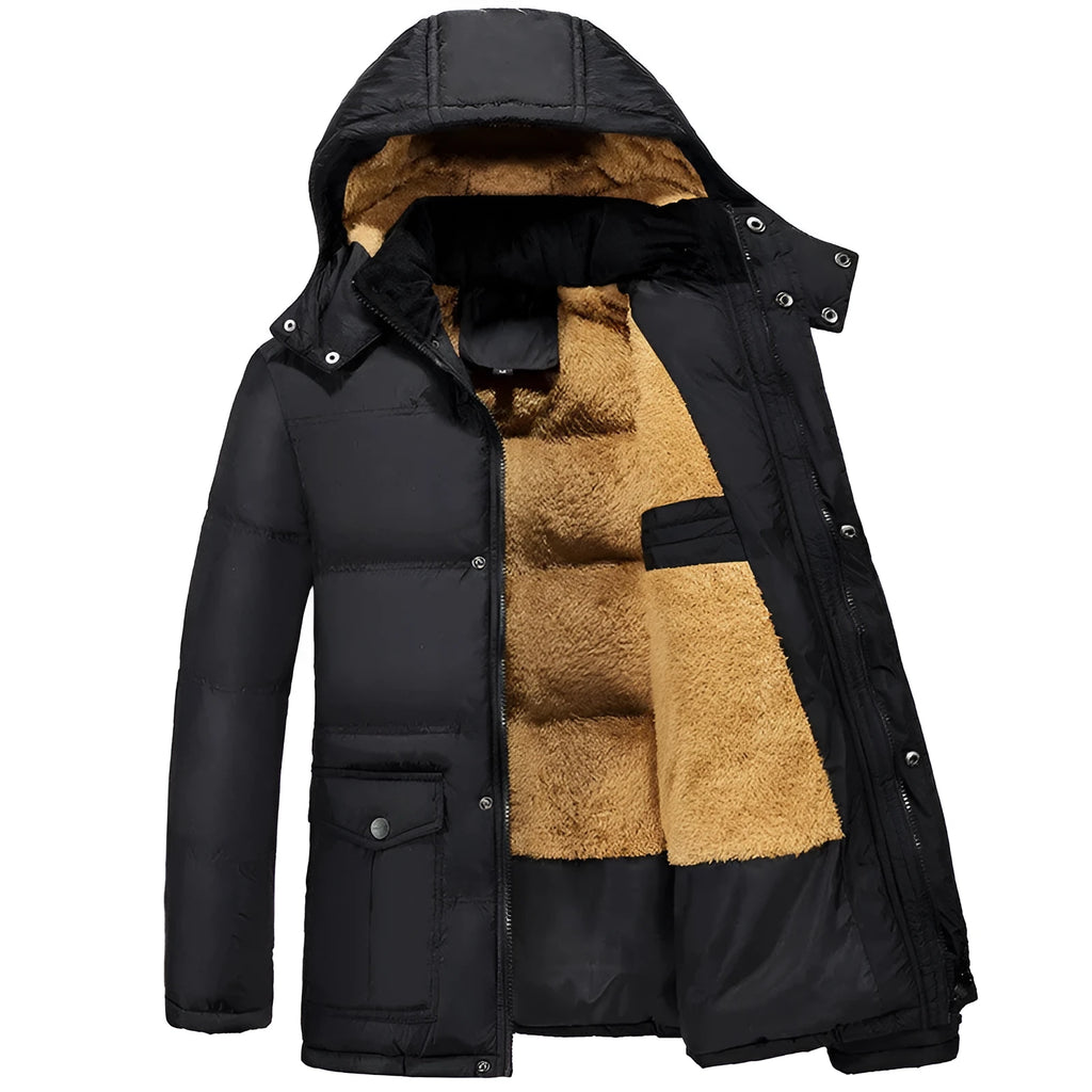 Man wearing a black hooded double-breasted padded winter jacket with a velvet lining.