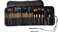 24-piece professional makeup brush set with wooden handles in gift bag packaging
